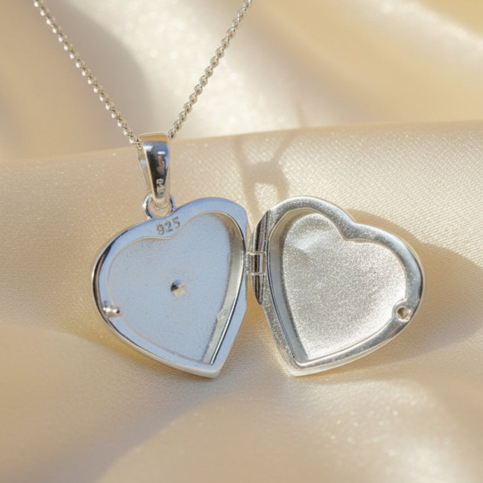 silver heart locket inside view, handcrafted in lancashire