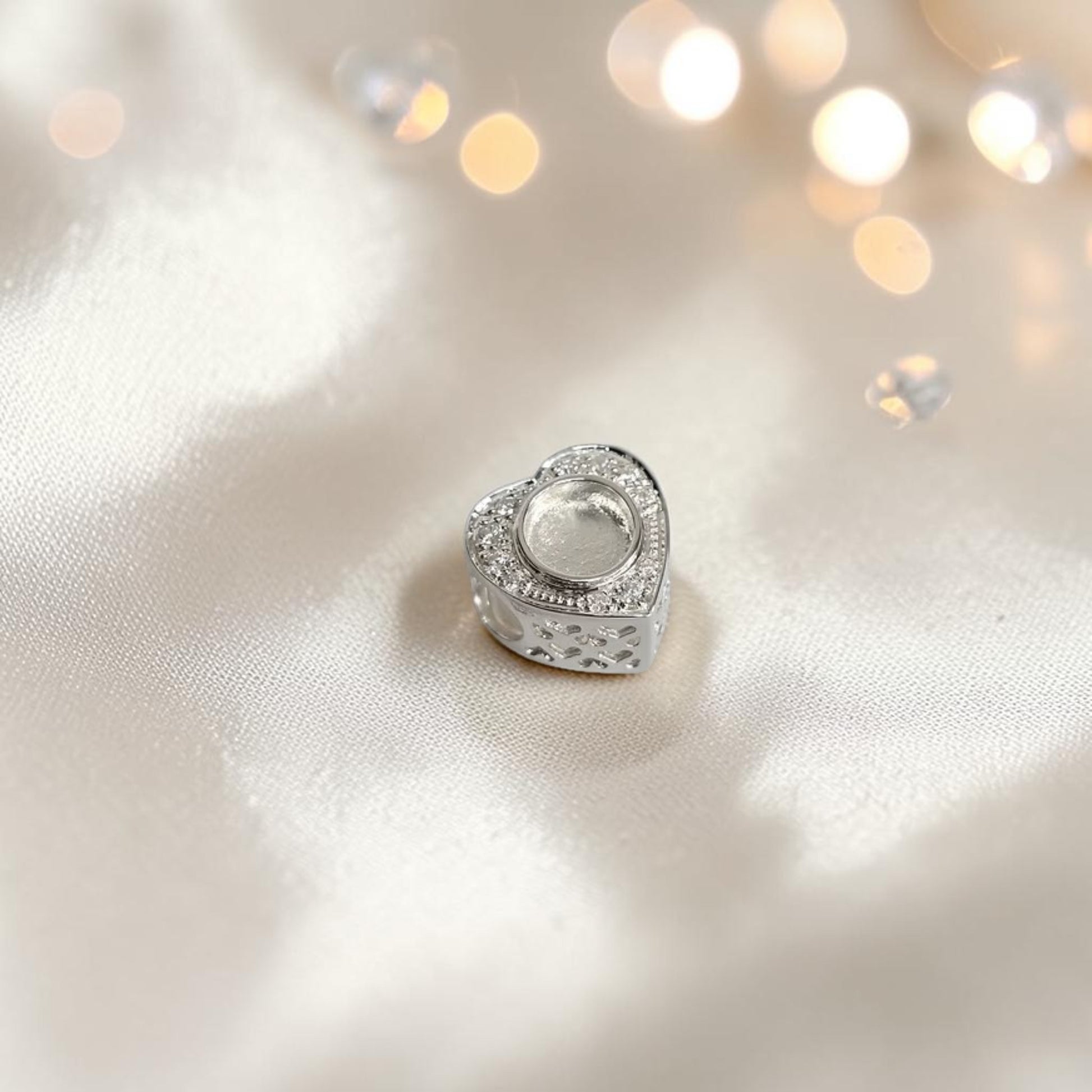 Heart Cut Out Charm — sterling silver CZ ashes memorial charm, handcrafted in Lancashire, UK