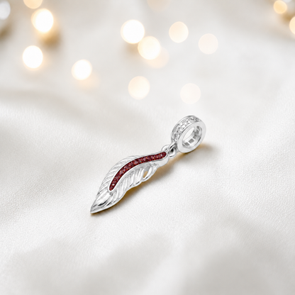 Ruby red sterling silver heavens feather  ashes memorial dangle  charm, handcrafted in Lancashire by keepsake memorial