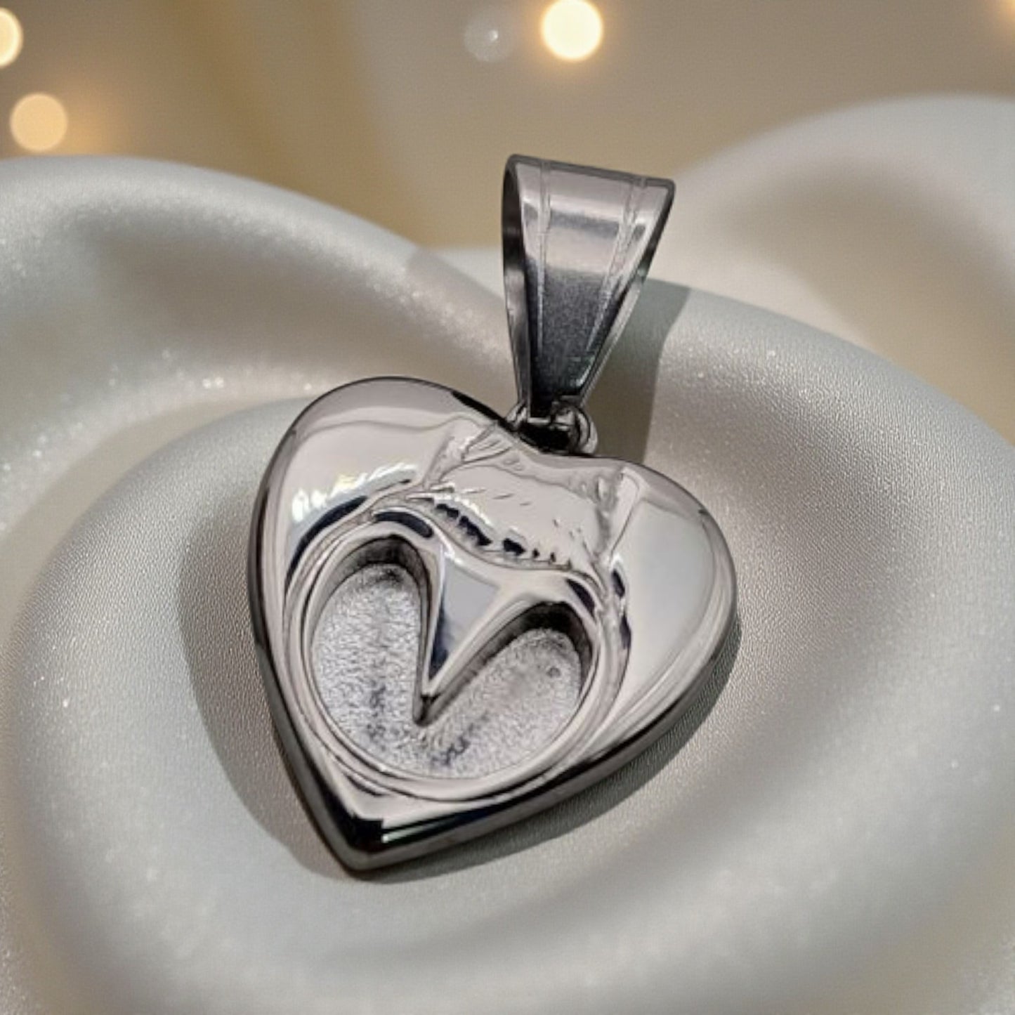 stainless steel horse hoof ashes memorial pendant, handcrafted in Lancashire, UK