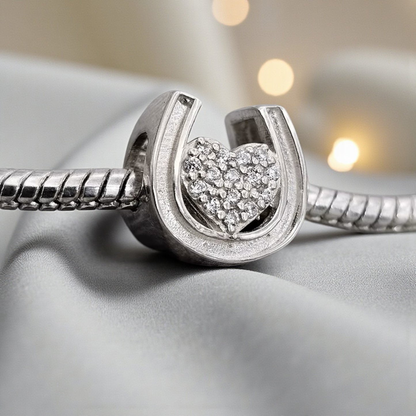 silver sparkle heart horseshoe charm, handcrafted in lancashire, uk