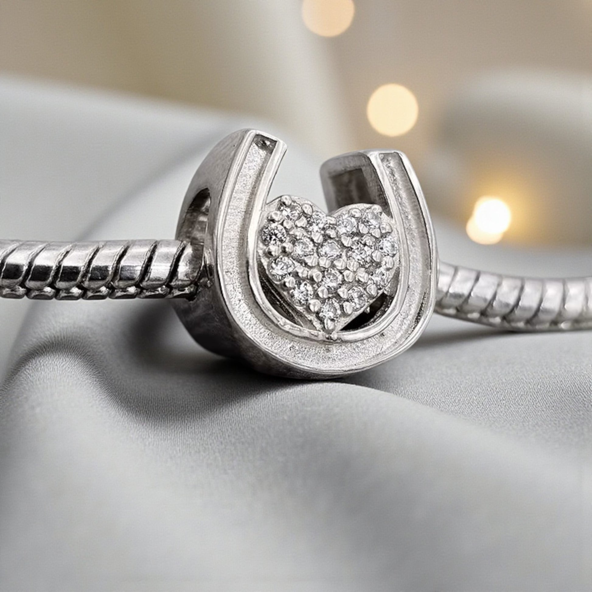 silver sparkle heart horseshoe charm, handcrafted in lancashire, uk
