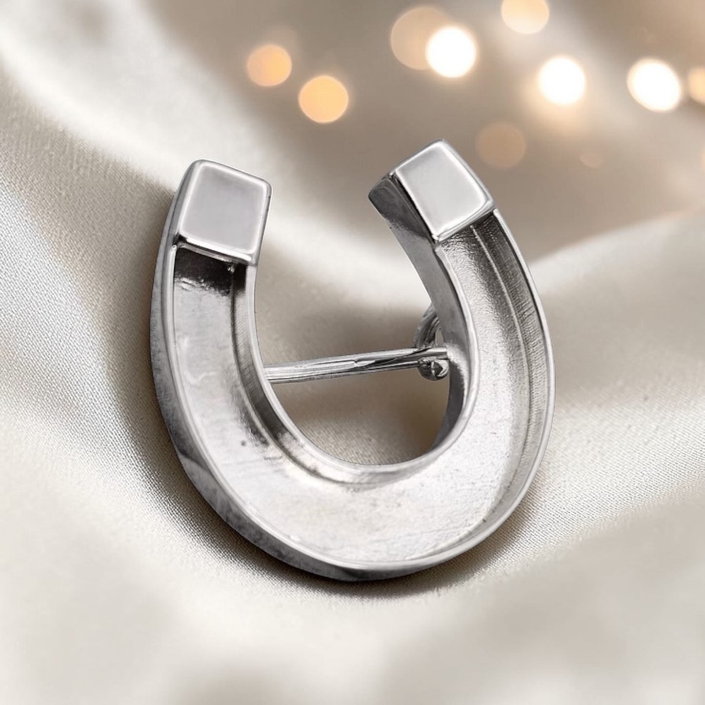 Midnight Stock Pin — silver horseshoe ashes memorial stock pin, side view, handcrafted in the UK