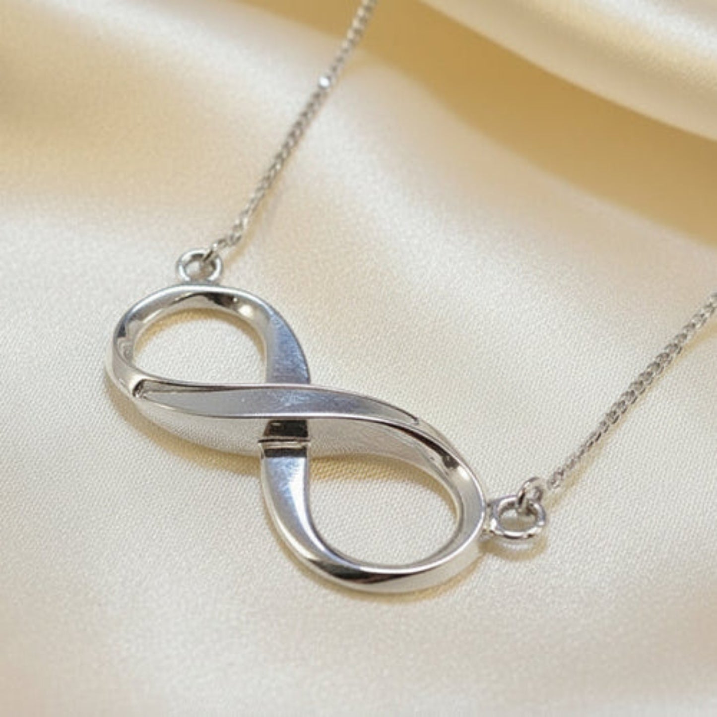 silver infinity memorial pendant, handcrafted in lancashire