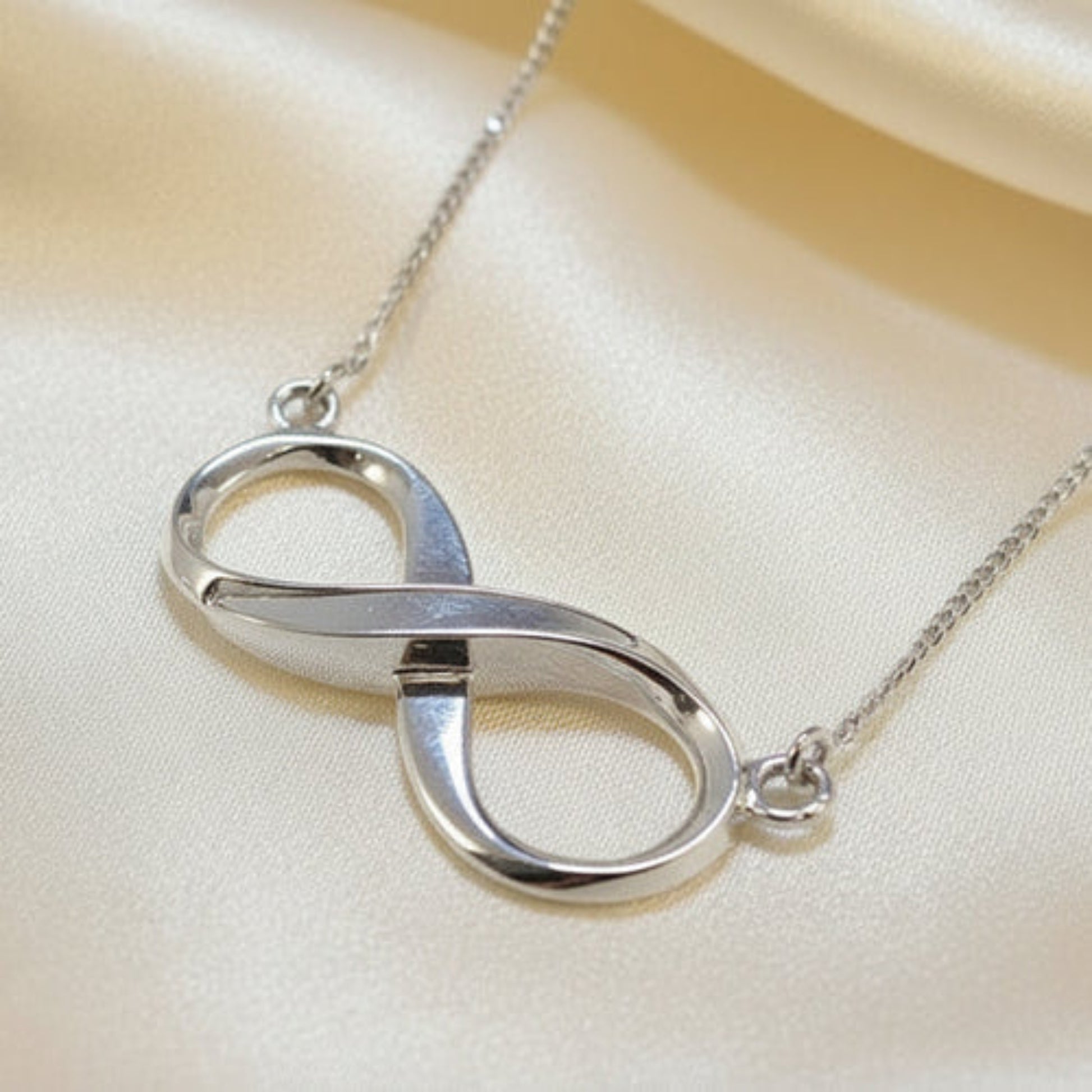 silver infinity memorial pendant, handcrafted in lancashire
