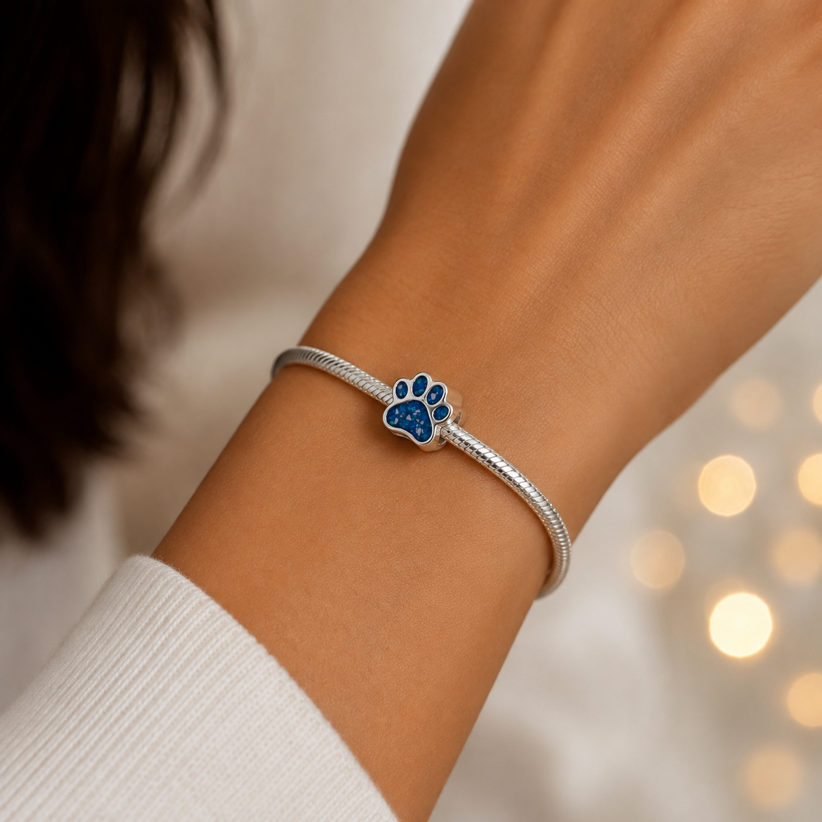 Lily paw silver ashes charm, in royal blue, handcrafted in Lancashire UK - by Keepsake Memorial Jewellery 