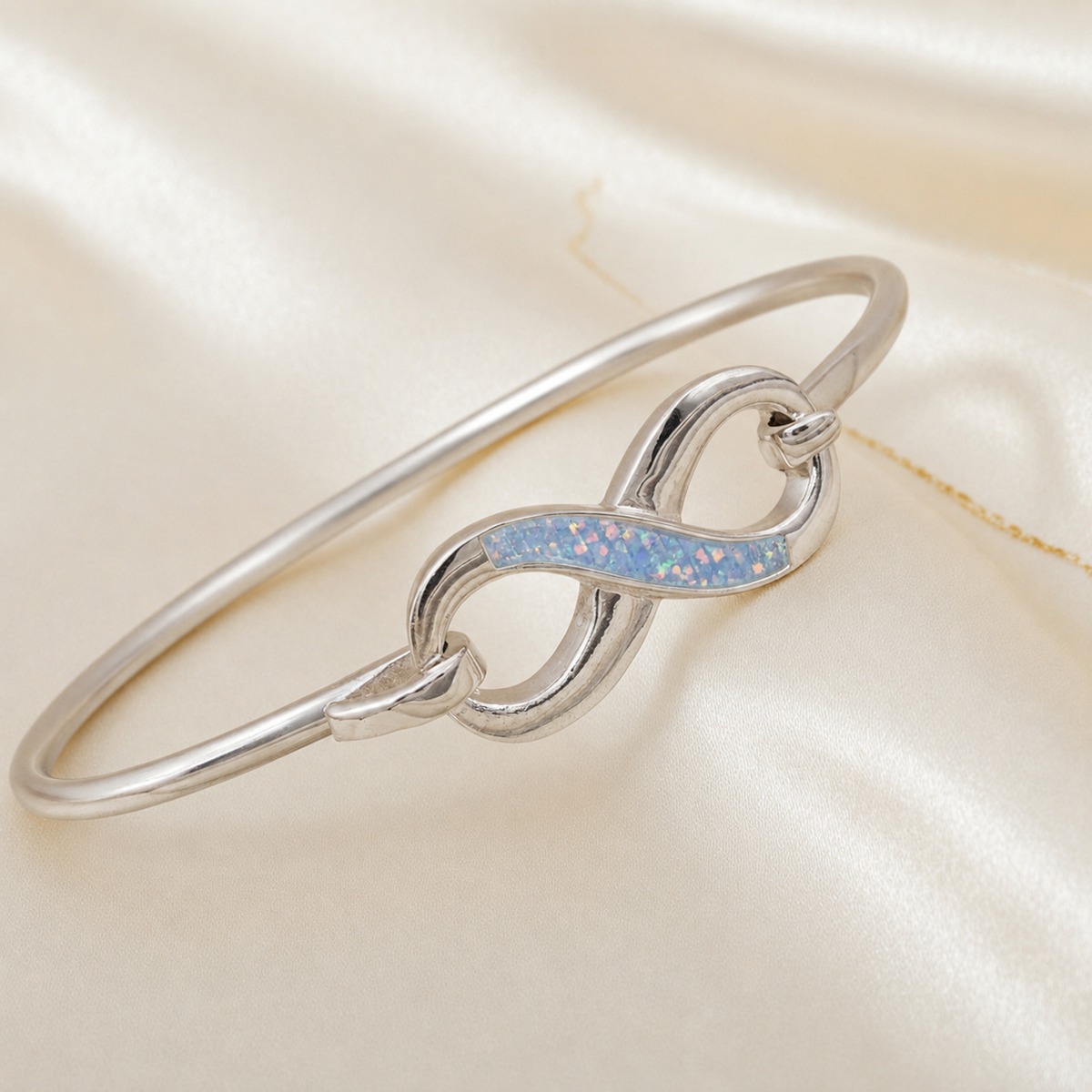 Lunara Bangle — silver infinity ashes memorial bangle, handcrafted in Lancashire, UK - by Keepsake Memorial Jewellery