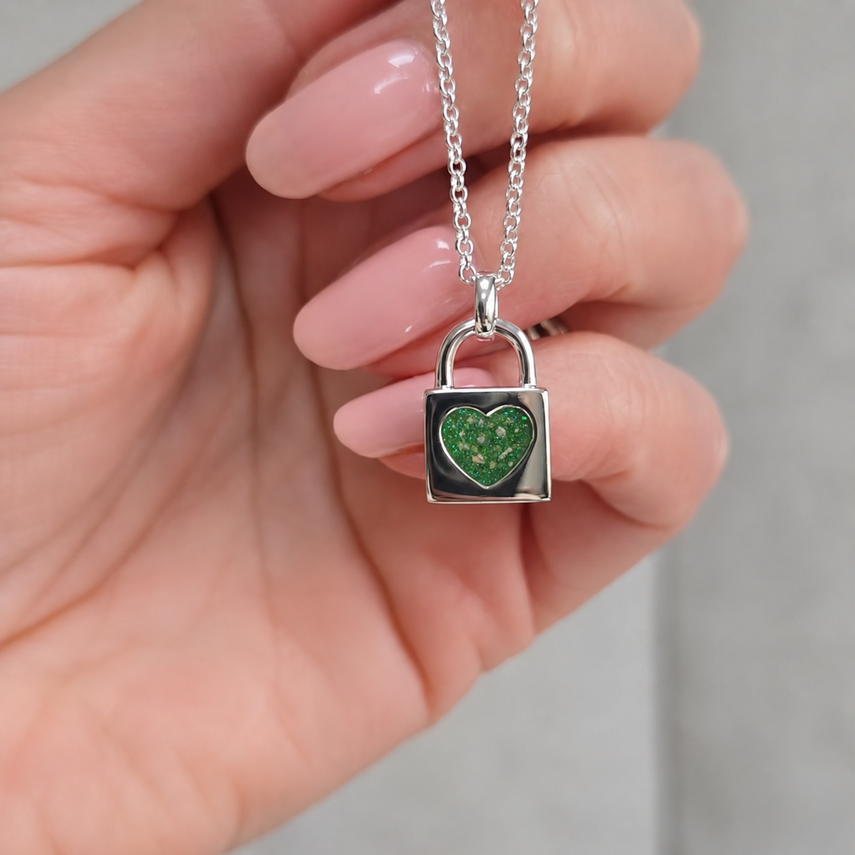 Mara sterling silver heart padlock pendant in fruit green, handcrafted in Lancashire UK