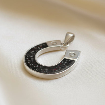 Midnight horseshoe ashes pendant in black flame, handcrafted in Lancashire UK - by Keepsake Memorial Jewellery
