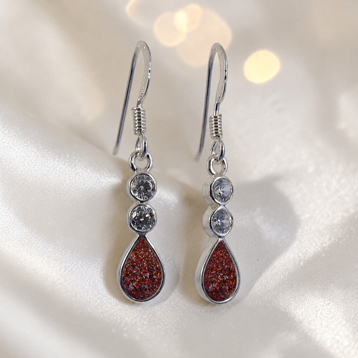 Acrux Earrings — silver pear drop ashes memorial earrings in Copper Mocha resin, handcrafted in Lancashire, UK