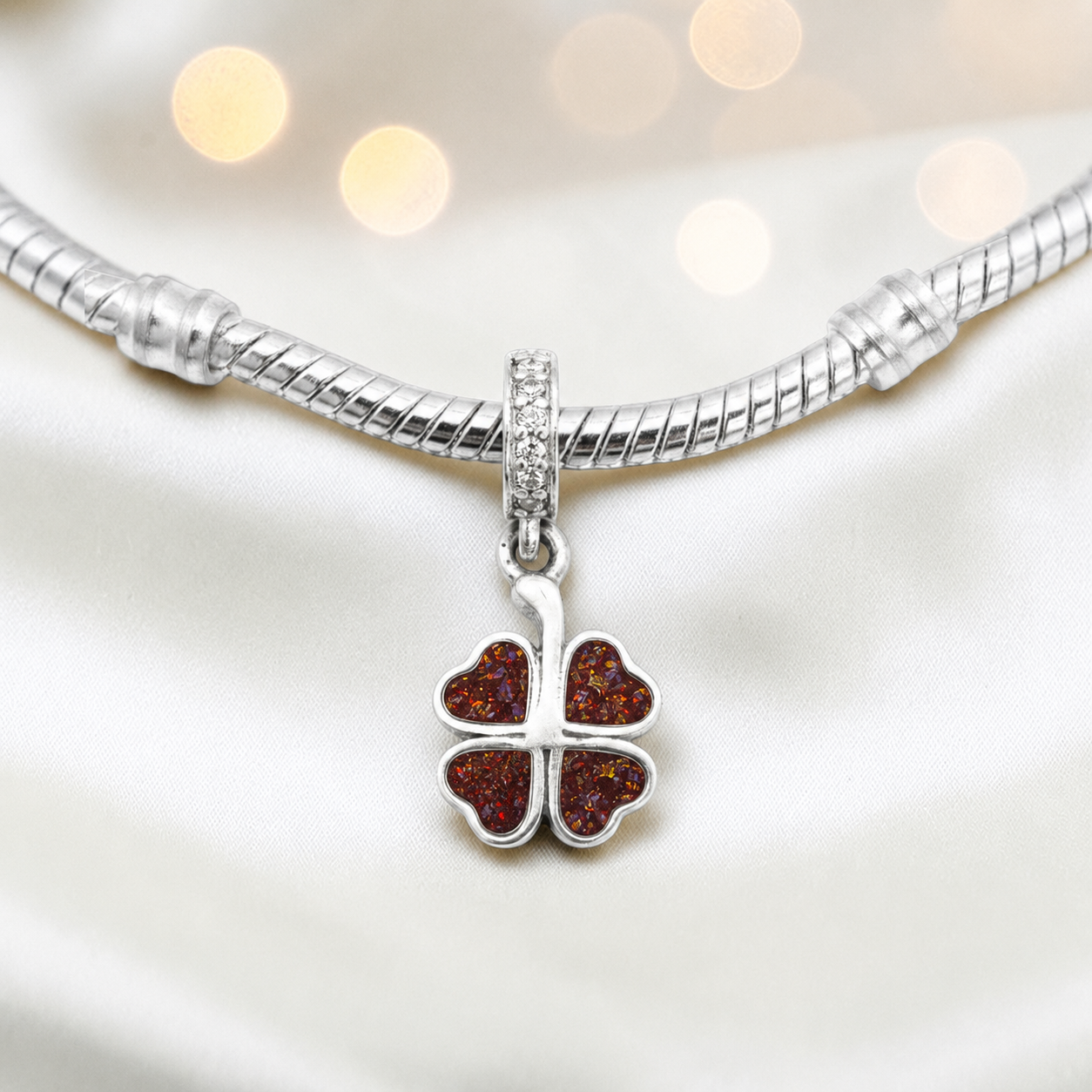 Copper mocha sterling silver clover dangle ashes memorial charm, handcrafted in Lancashire by keepsake memorial