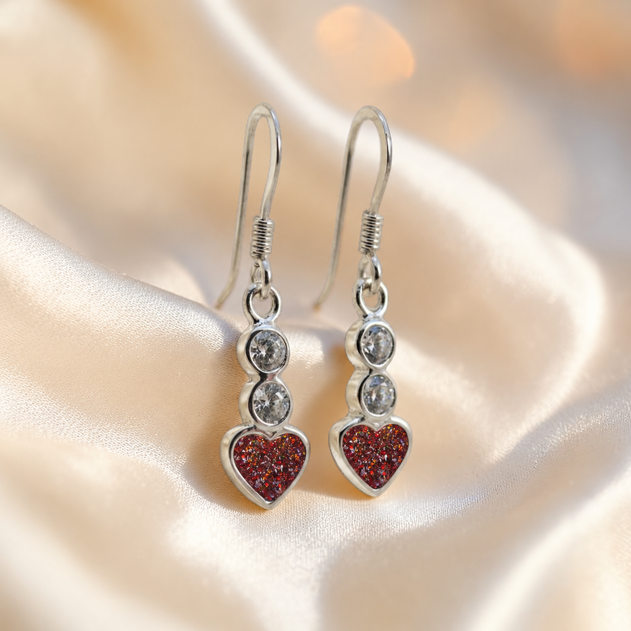 Pleione Earrings — silver heart drop ashes memorial earrings in Copper Mocha resin, handcrafted in Lancashire, UK
