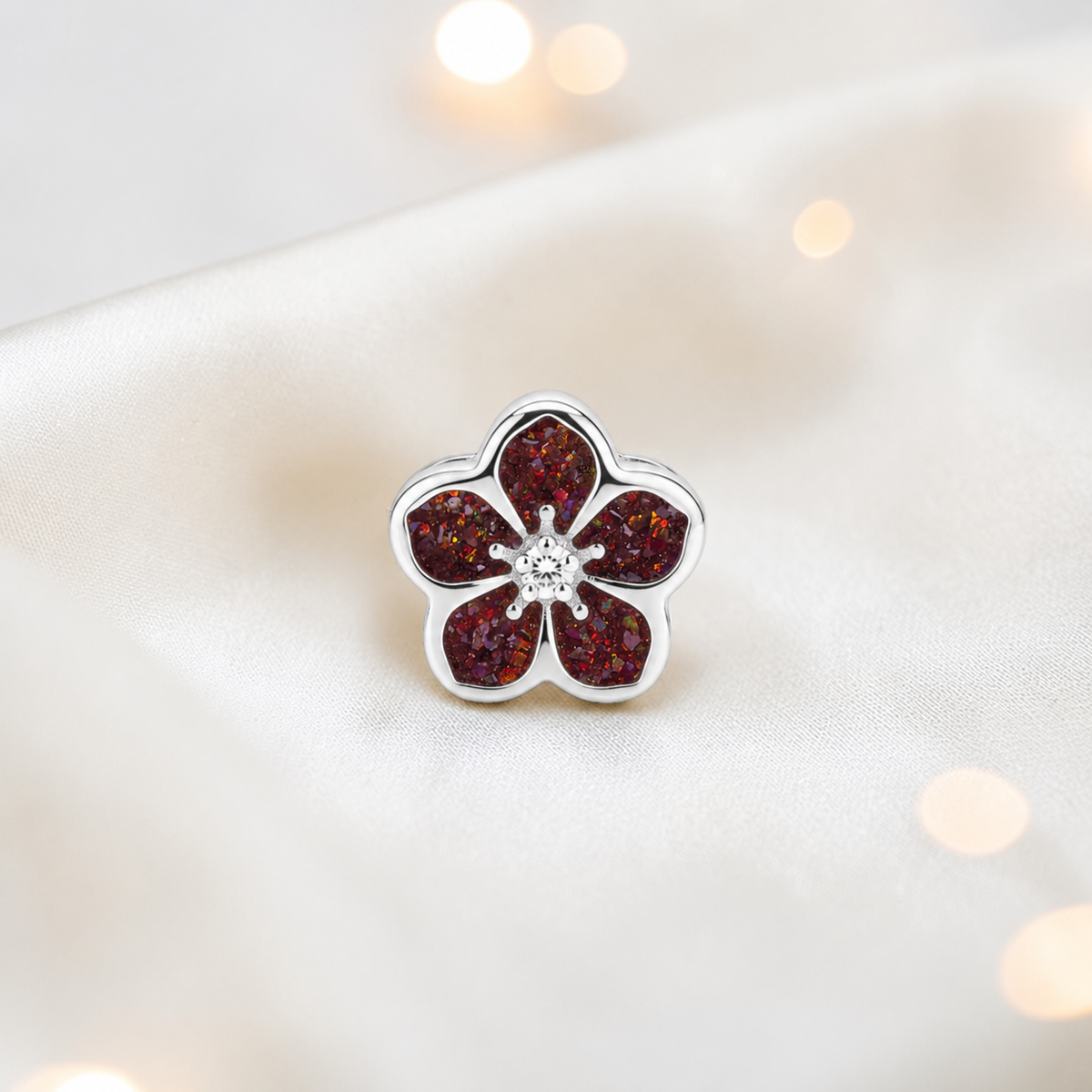 Copper mocha sterling silver forget me not ashes memorial charm, handcrafted in Lancashire by keepsake memorial