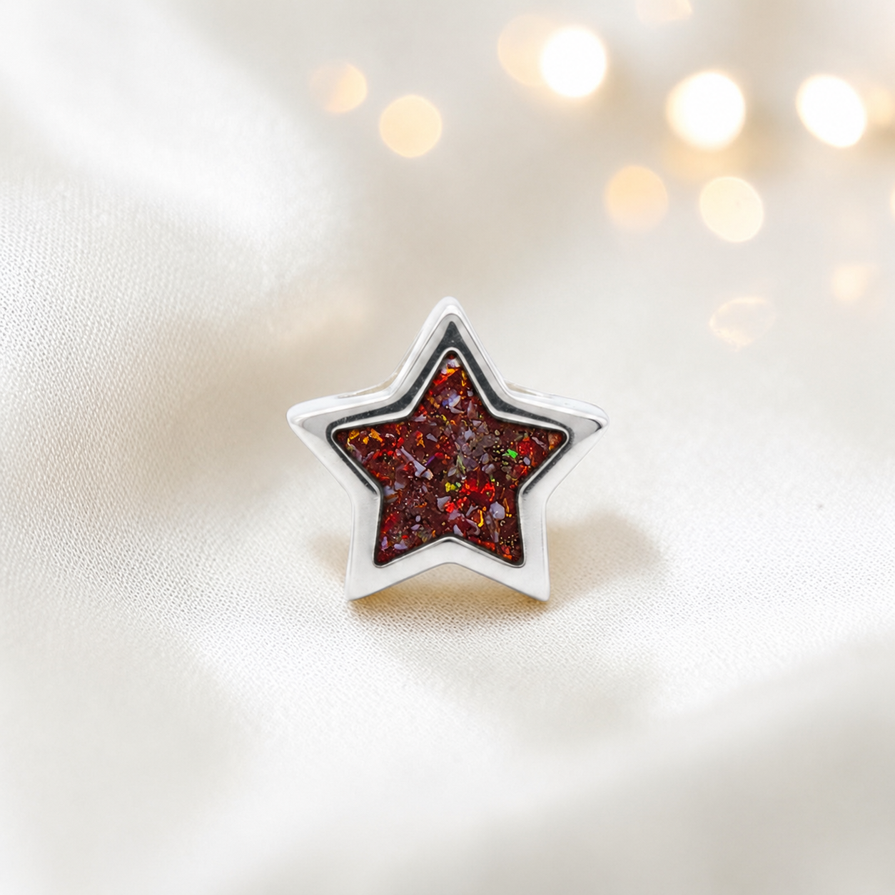 Copper mocha sterling silver star ashes memorial charm, handcrafted in Lancashire by keepsake memorial