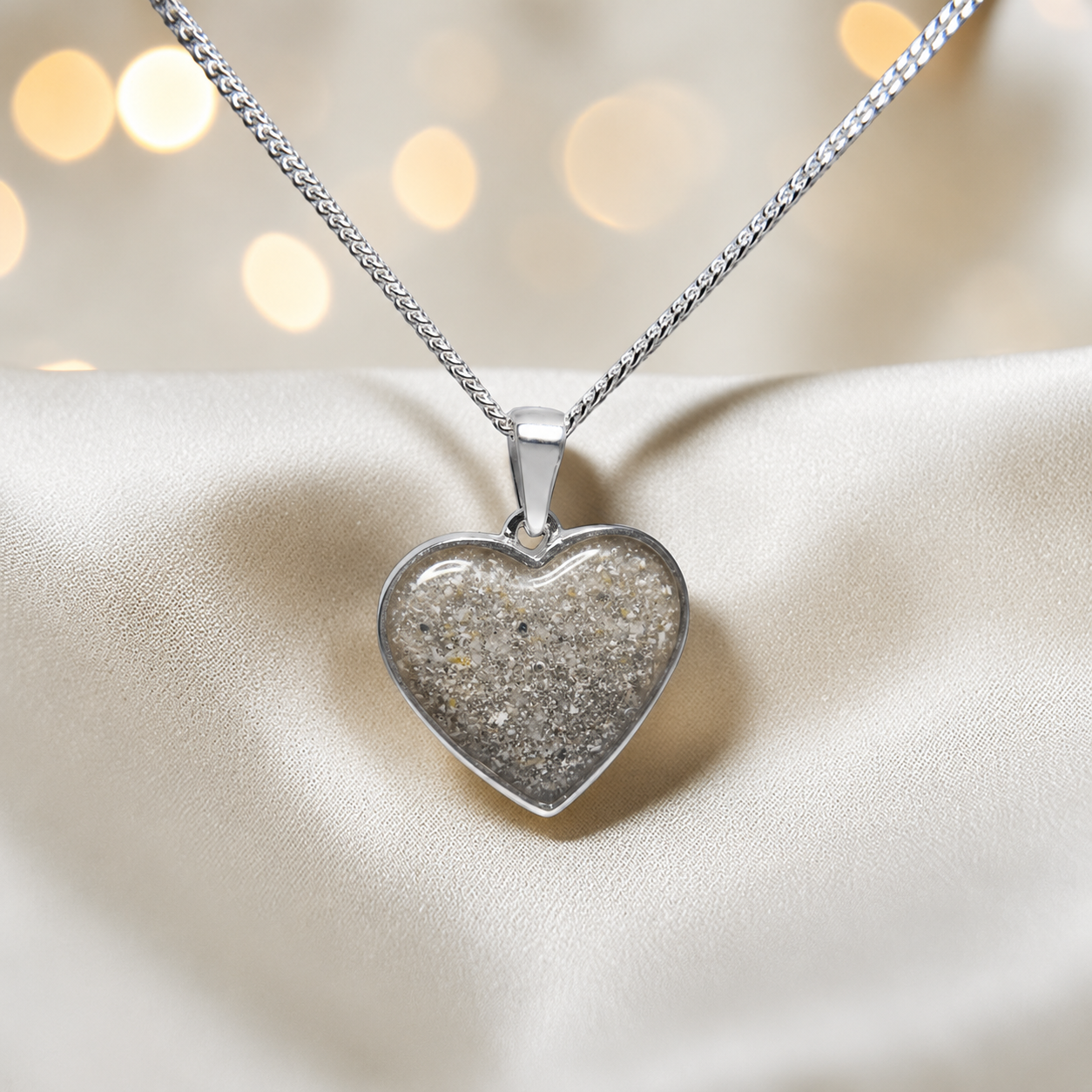 Silver Betel heart ashes memorial pendant in Natural Ash, handcrafted in Lancashire UK