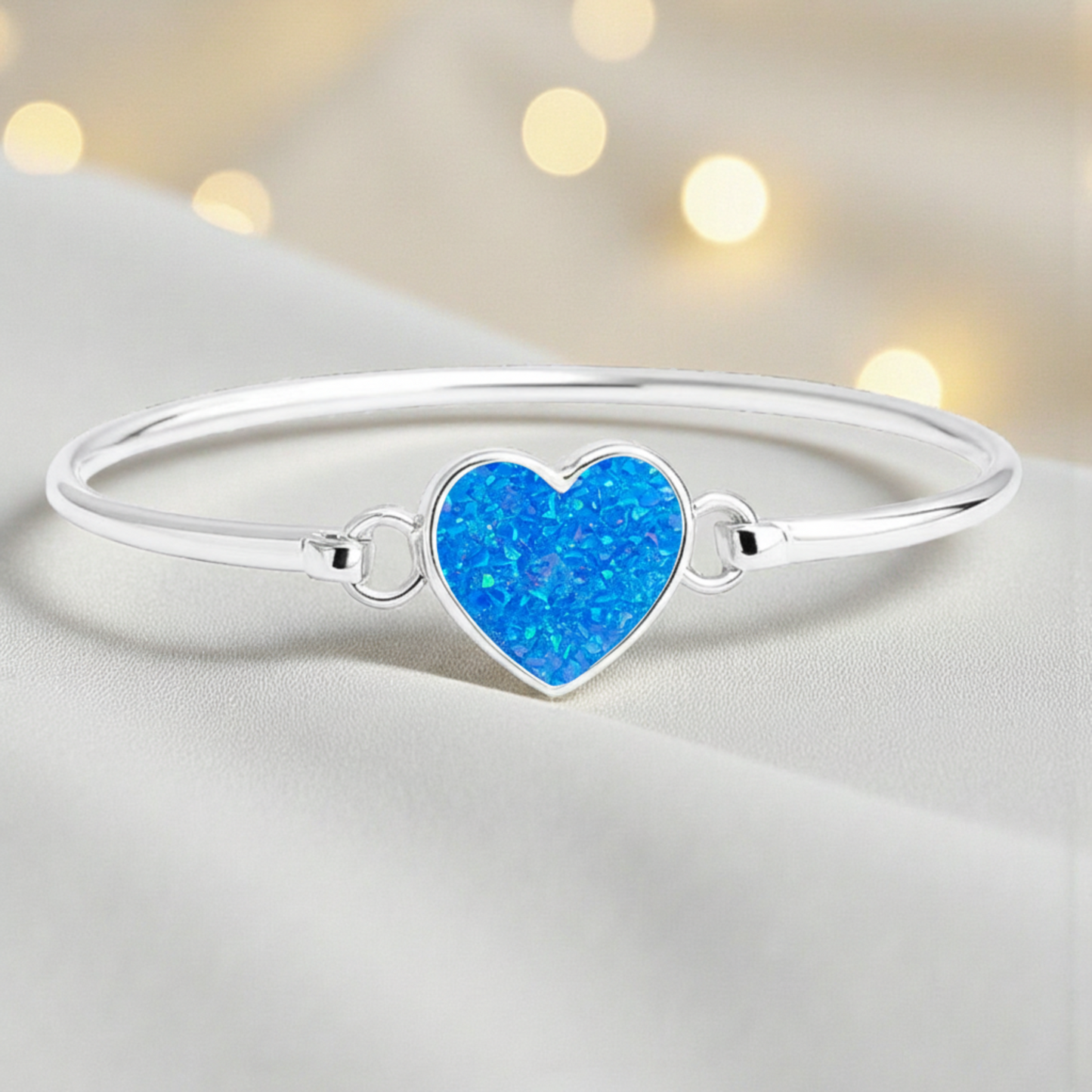 Nyx Bangle — silver ashes memorial bangle with royal blue opal, handcrafted in Lancashire, UK