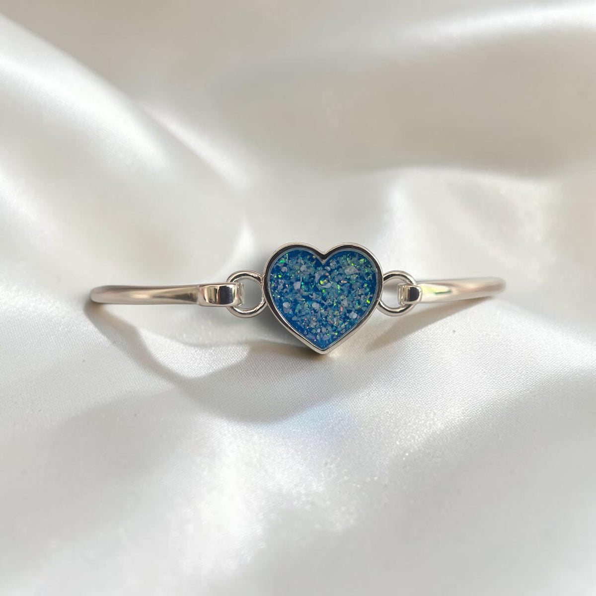 Nyx Bangle — silver heart shaped ashes memorial bangle, handcrafted in Lancashire, UK - by Keepsake Memorial Jewellery