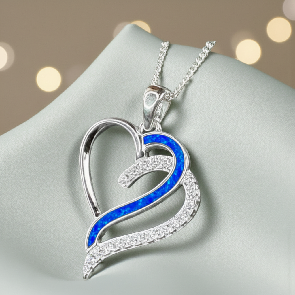 Olive Pendant — silver ashes memorial pendant with royal blue opal in outer side recess, handcrafted in Lancashire, UK
