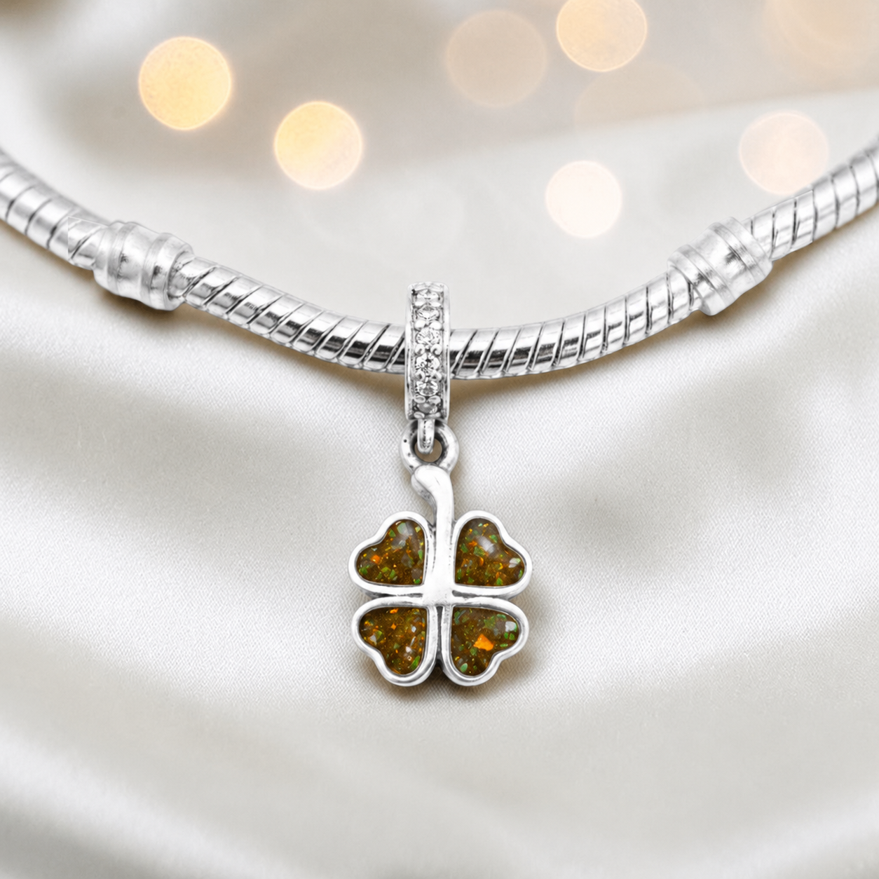Gold olive sterling silver clover dangle ashes memorial charm, handcrafted in Lancashire by keepsake memorial