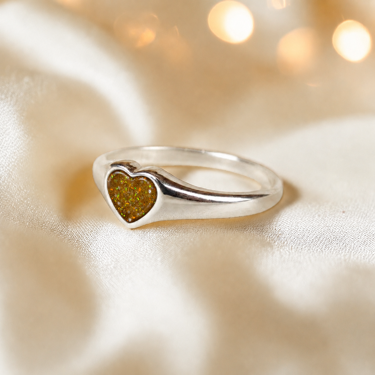 Eden Heart shaped memorial ashes ring in gold olive,  handcrafted in Lancashire, UK.