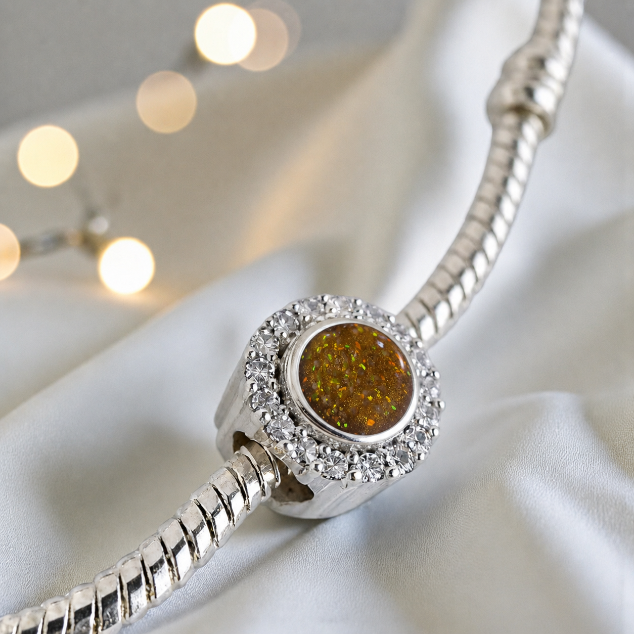 Gold olive sterling silver halo ashes memorial charm, handcrafted in Lancashire by keepsake memorial