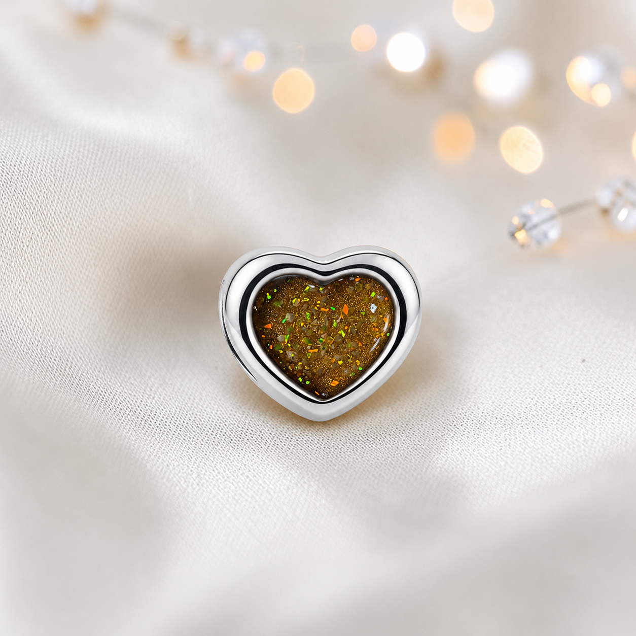 Gold olive sterling silver peaceful heart ashes memorial charm, handcrafted in Lancashire by keepsake memorial