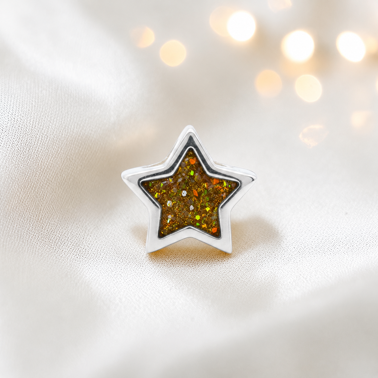 Gold olive sterling silver star ashes memorial charm, handcrafted in Lancashire by keepsake memorial
