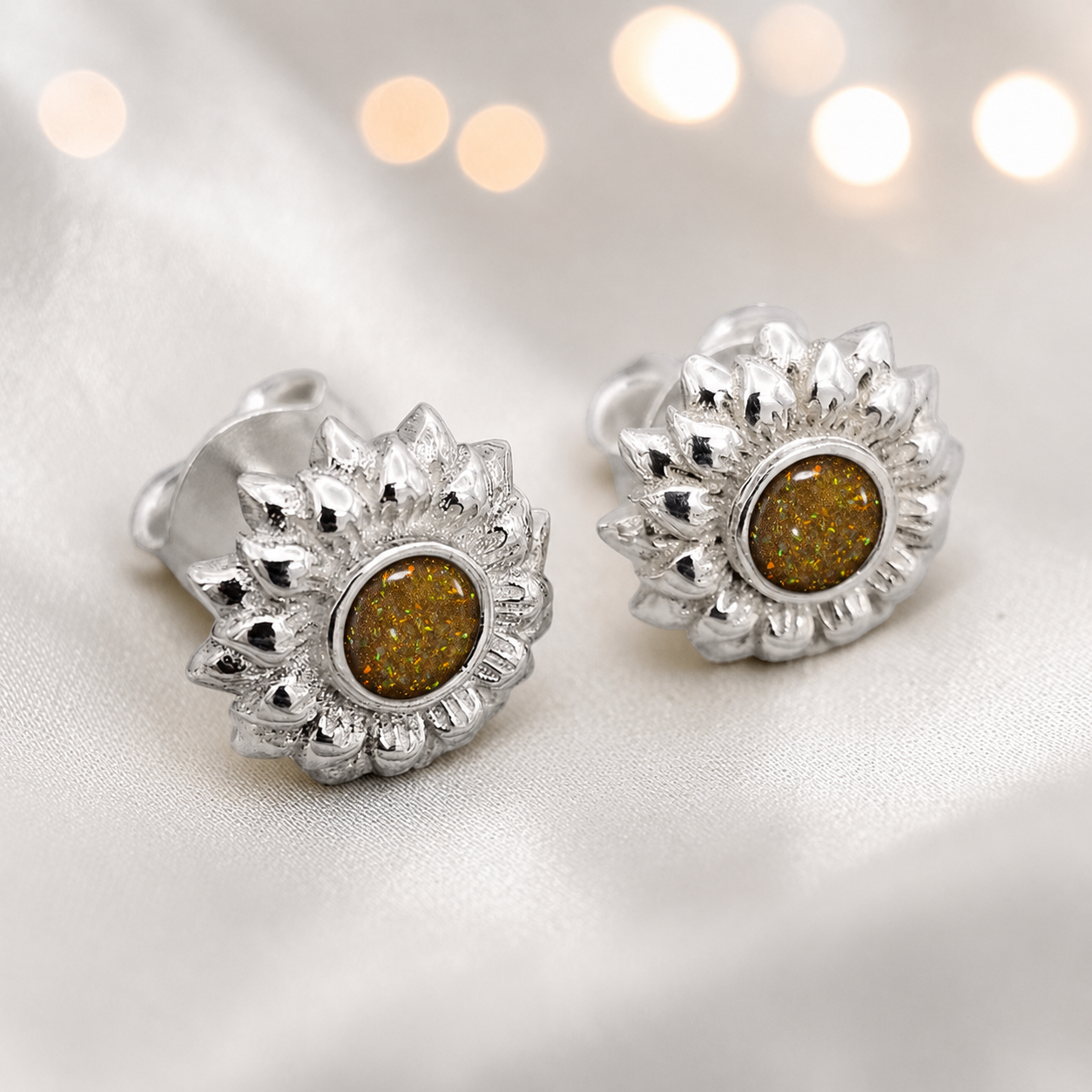 Flora Earrings — silver sunflower ashes memorial stud earrings in Gold Olive resin, handcrafted in Lancashire, UK