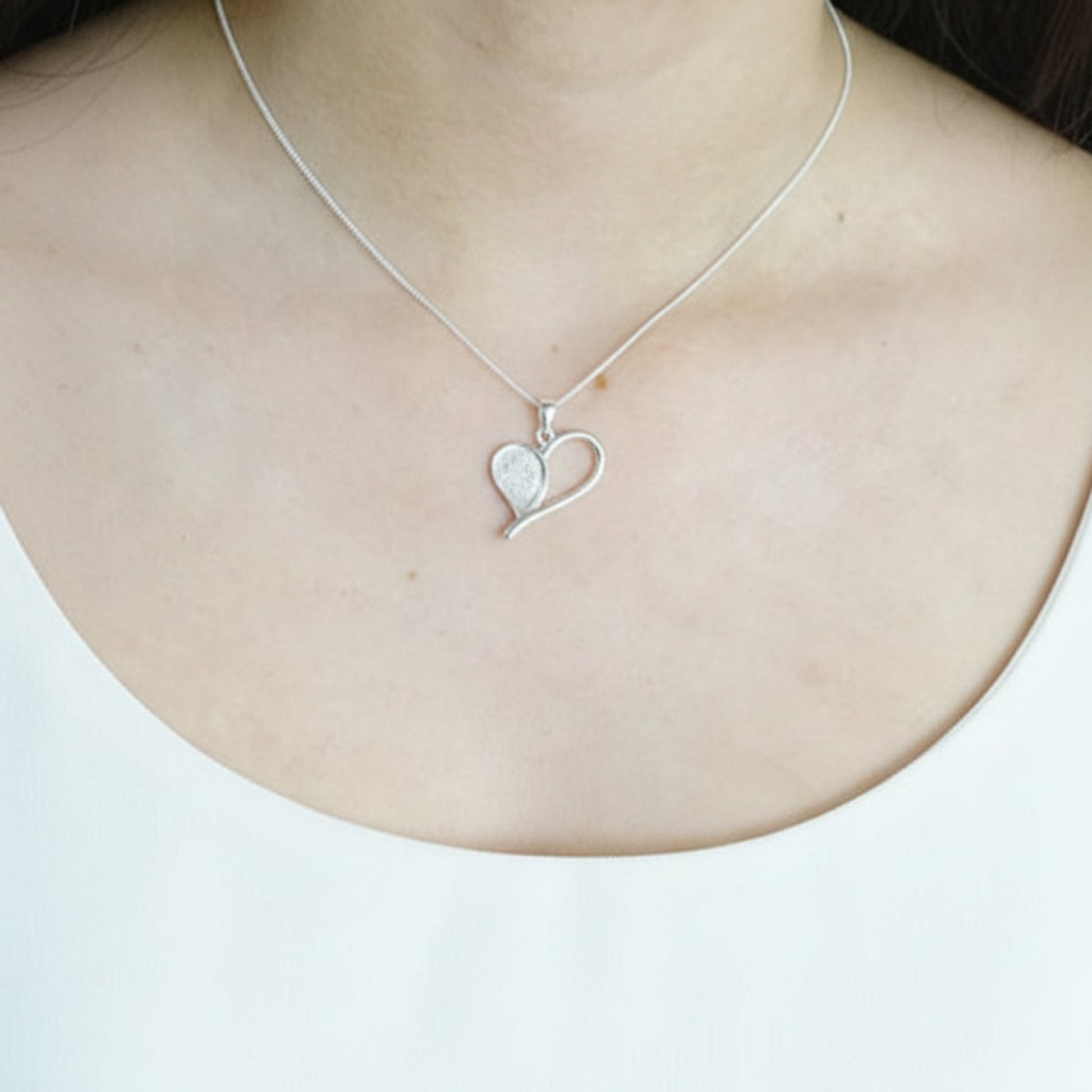 open heart memory necklace on model