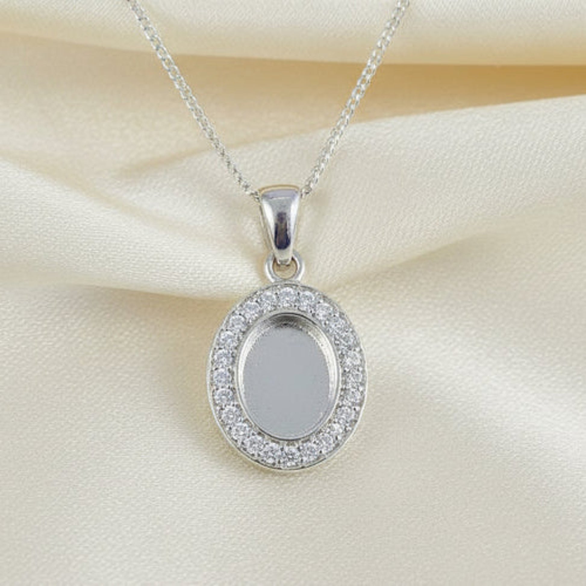 silver oval pendant with cz, handcrafted in lancashire