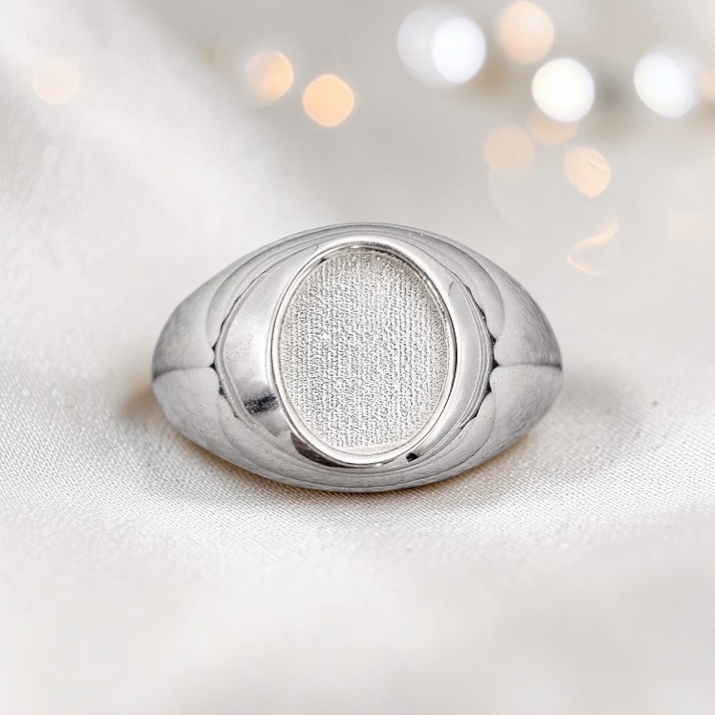 silver oval mens signet ring, handcrafted in lancashire