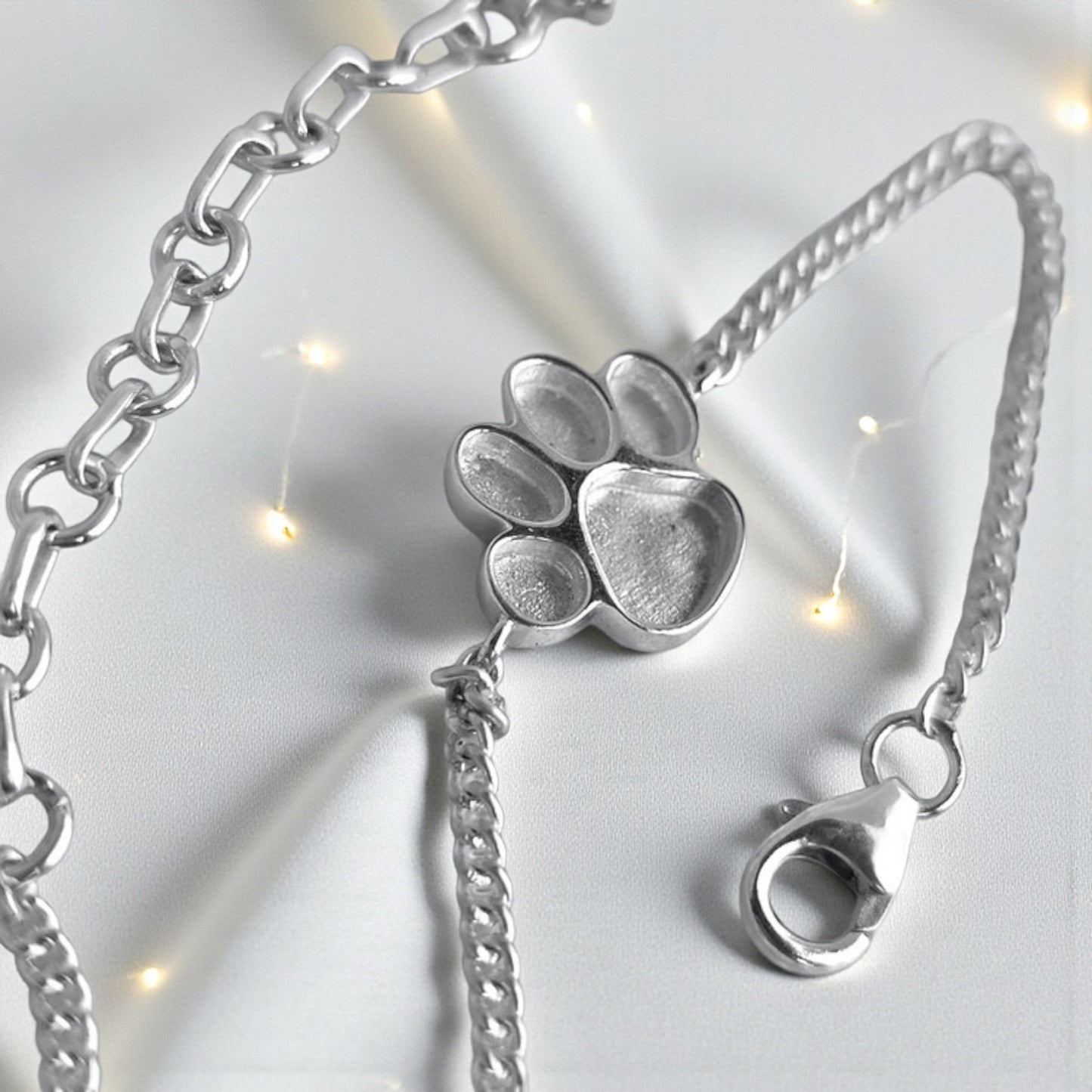 adjustable silver paw bracelet, handcrafted in lancashire