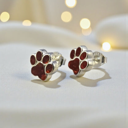 Cleo pet paw memorial ear studs — sterling silver paw print ashes earrings, handcrafted in Lancashire, UK