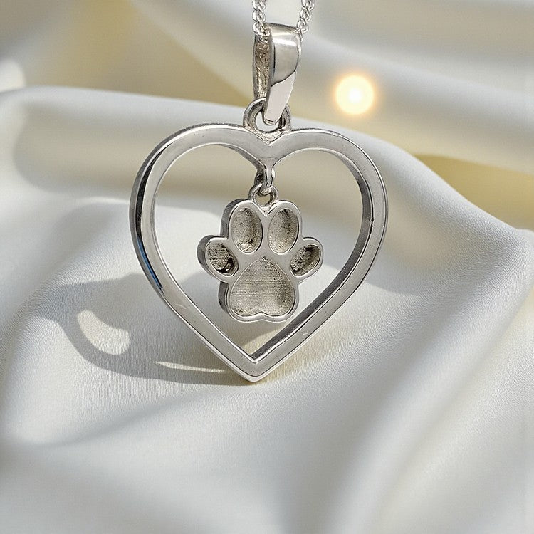 silver paw print heart keepsake pendant, handcrafted in lancashire uk