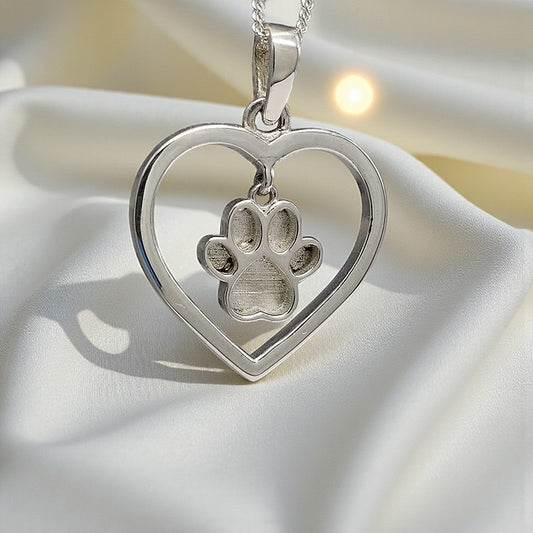silver paw print heart keepsake pendant, handcrafted in lancashire uk