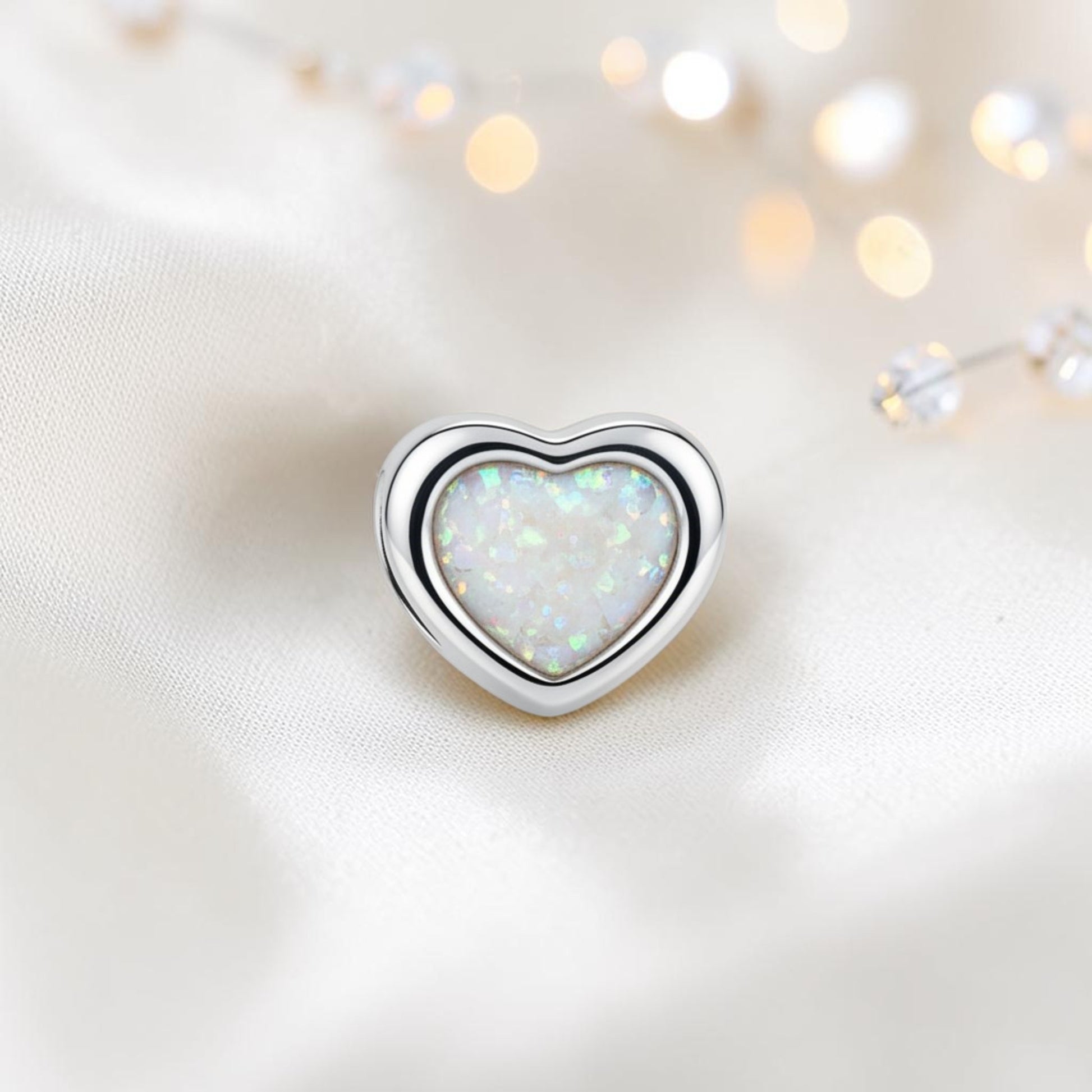 sterling silver peaceful heart ashes memorial charm, handcrafted in Lancashire by keepsake memorial