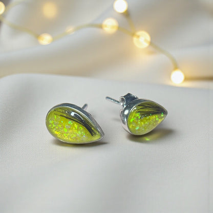 Pure Radiance memorial earrings — sterling silver pear-shaped hair and ashes earrings, handcrafted in Lancashire, UK