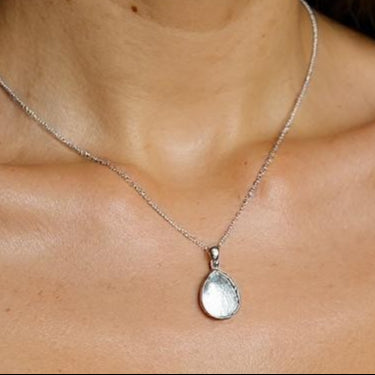 Pear shape solid silver pendant