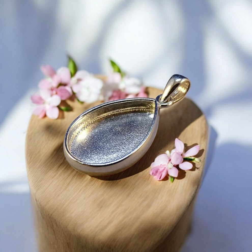 Pear shape solid silver pendant