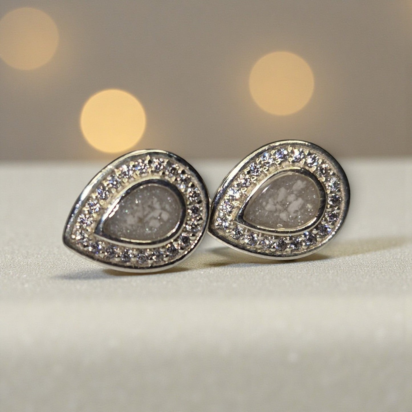 Seraph Glow Earrings — silver pear-shaped ashes memorial earrings, handcrafted in Lancashire, UK