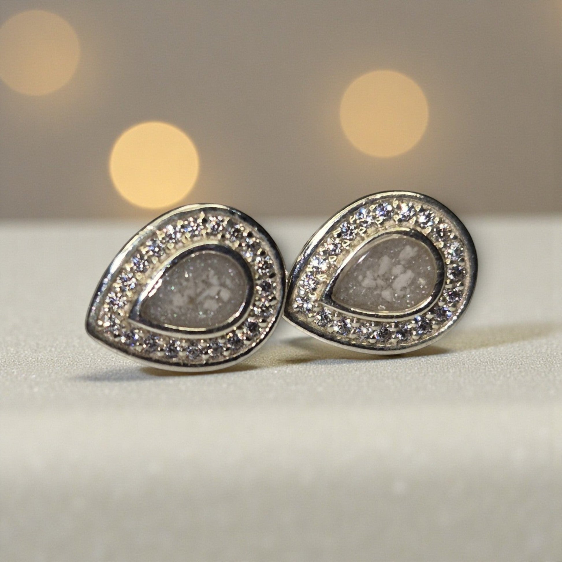 Seraph Glow Earrings — silver pear-shaped ashes memorial earrings, handcrafted in Lancashire, UK