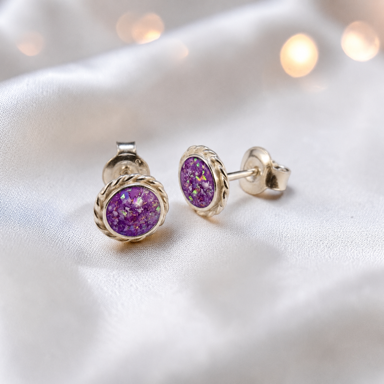 Eterna memorial stud earrings in Rose Pink opal — sterling silver rope edge, handcrafted in Lancashire, UK