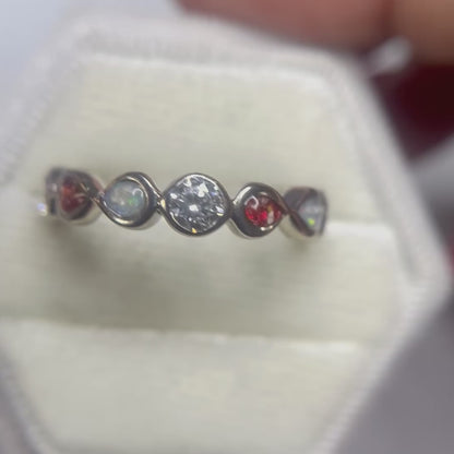 Keepsake Memorial silver ladies infinity band CZ ashes ring - Celestina, shown rotating to display all angles