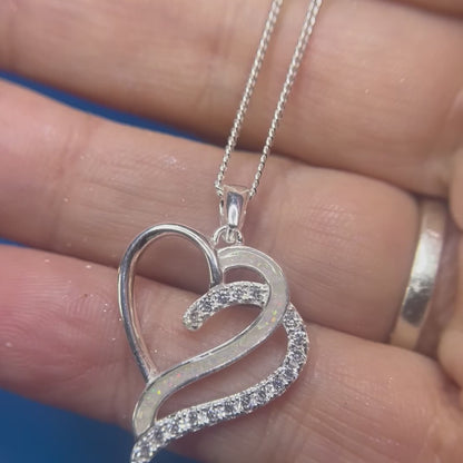 Keepsake Memorial silver ladies heart shape ashes pendant - Olive, shown rotating to display all angles
