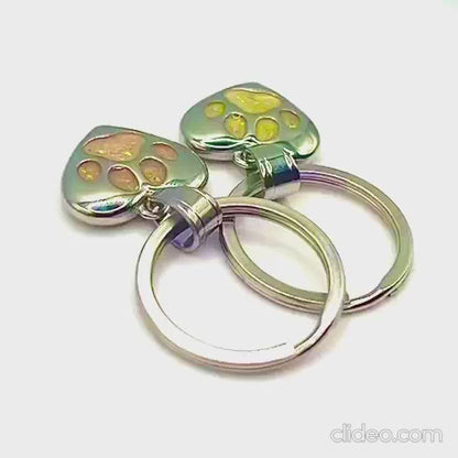 Milo paw keyring ashes charm, shown in video, handcrafted in Lancashire UK - by Keepsake Memorial Jewellery