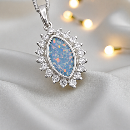 Princess CZ oval ashes pendant in baby blue, handcrafted in Lancashire UK