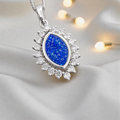 Princess CZ oval ashes pendant in royal blue, handcrafted in Lancashire UK