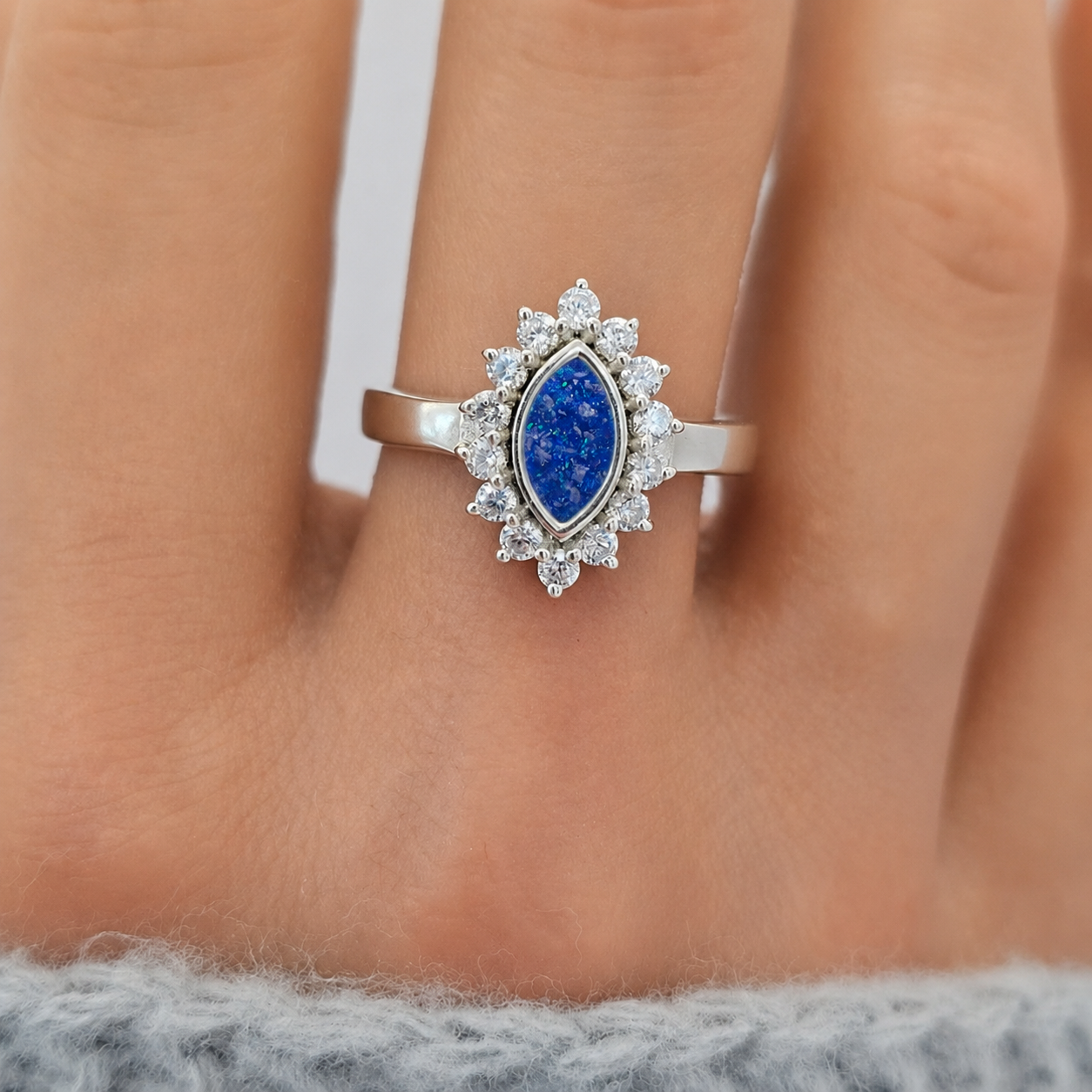 keepsake memorial princess ring in royal blue on hand, handcrafted in uk