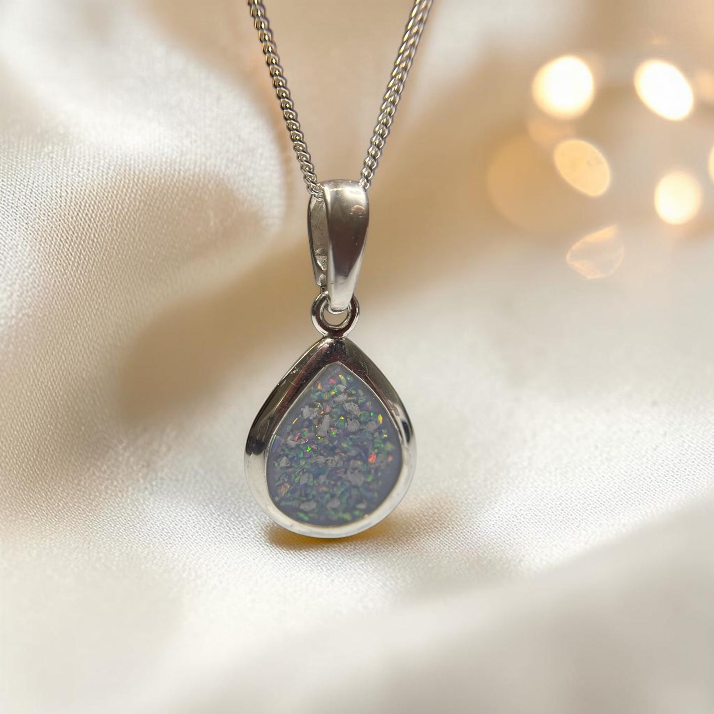 Procyon Pendant — silver pear ashes memorial necklace, handcrafted in the UK