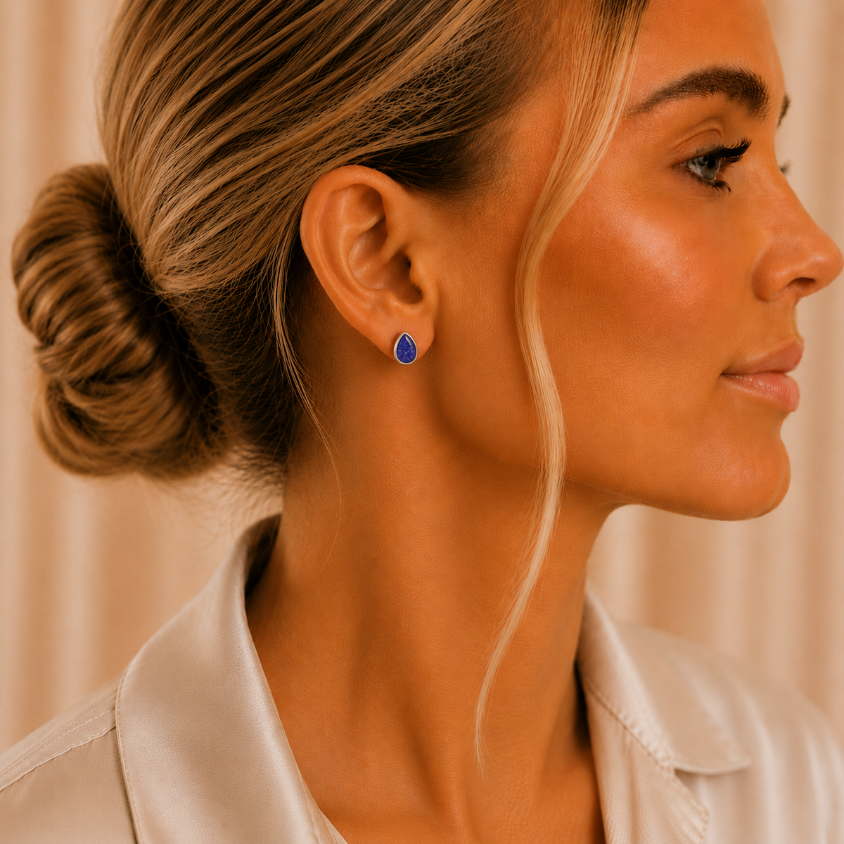 Pure Radiance memorial earrings — sterling silver pear-shaped ashes earrings, handcrafted in Lancashire, UK